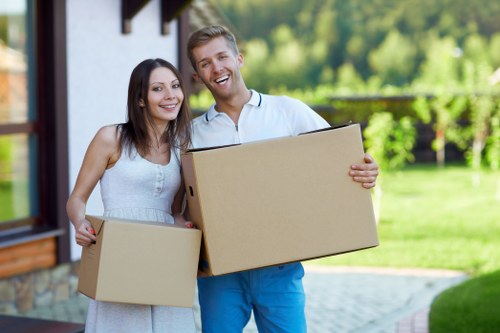 Student moving boxes and furniture in the Bromley area