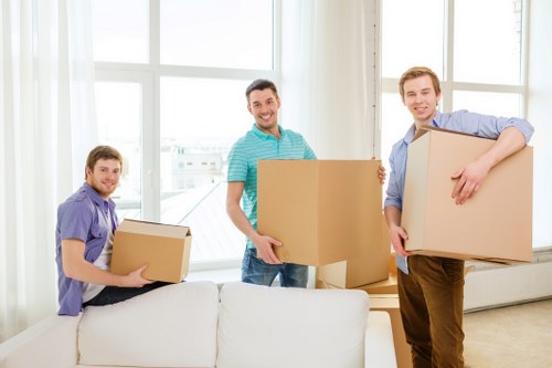 Loading household furniture into a removal van