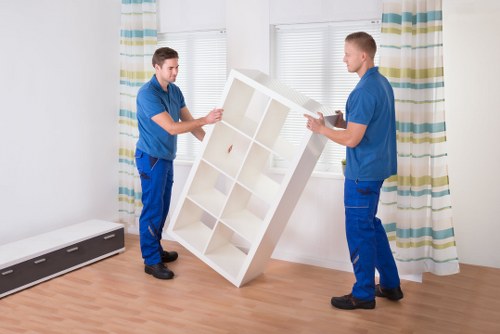 Trained Bromley removal staff handling boxes carefully during a move
