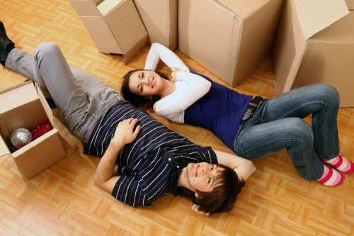 Loading furniture and boxes into a van for a Bromley move